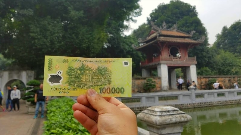 The 100,000 Vietnam Dong has a picture of the Temple of Literature printed on the back