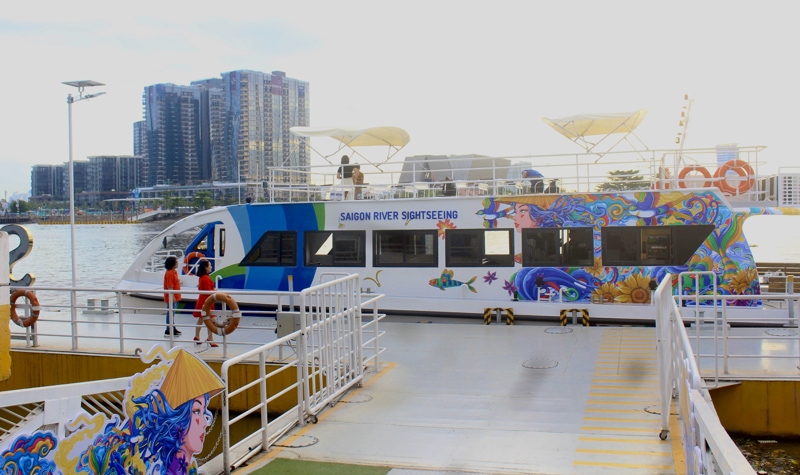 Enjoy a Scenic Cruise on the Saigon River from a Double-decker Boat