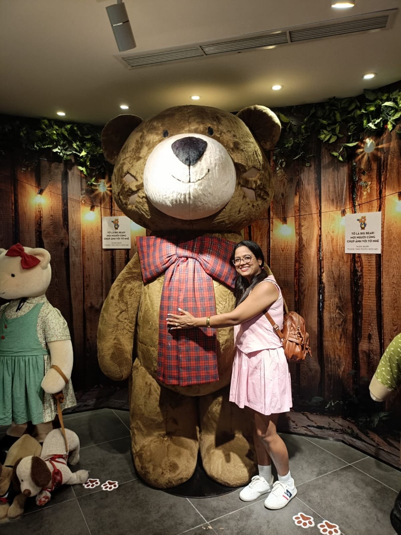 Friend of Mr Aakanksha takes photo in the Teddy Bear Museum