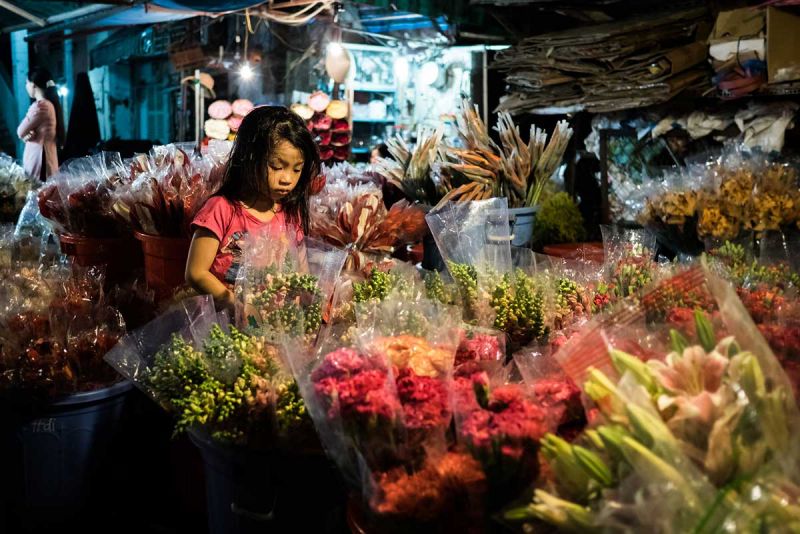 A Vietnamese kid with flower