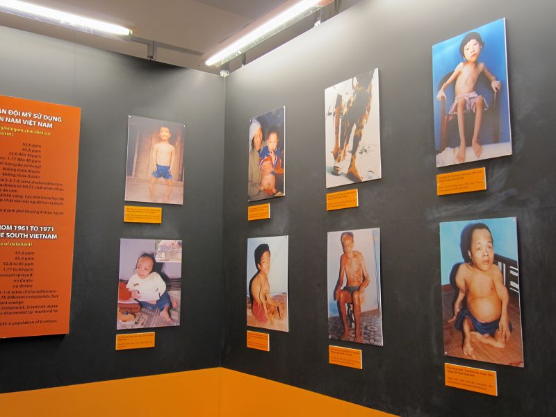 Agent Orange exhibition display at War Remnants Museum showing chemical herbicide impact documentation
