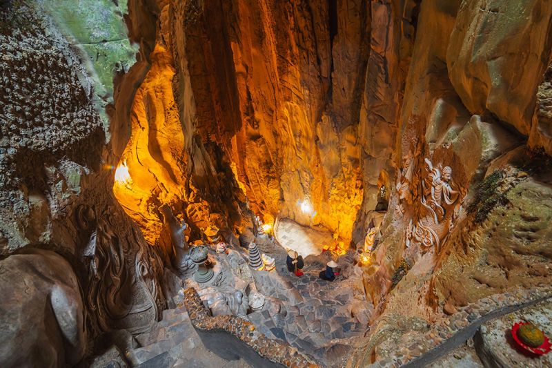Am Phu Cave underground passage Marble Mountains with stone carvings of Buddhist underworld scenes