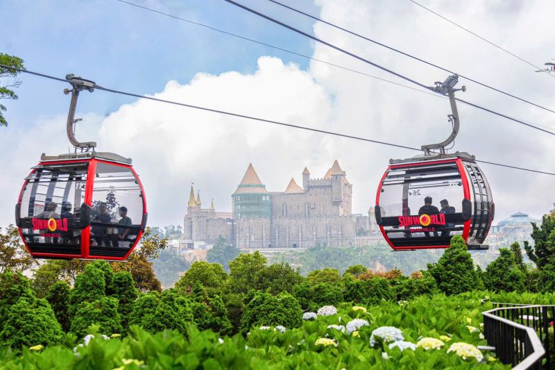 Ba Na Hills cable car Line 3 Thac Toc Tien L'Indochine gondola ascending above forest canopy