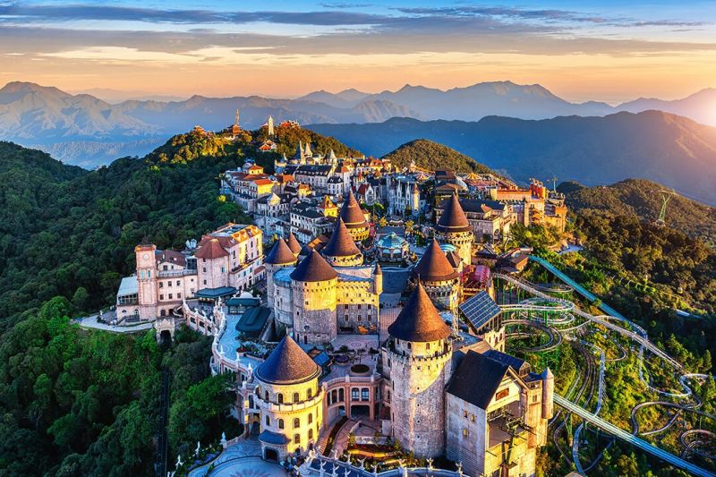 French Village at Ba Na Hills with cobblestone square and Gothic cathedral replica facade