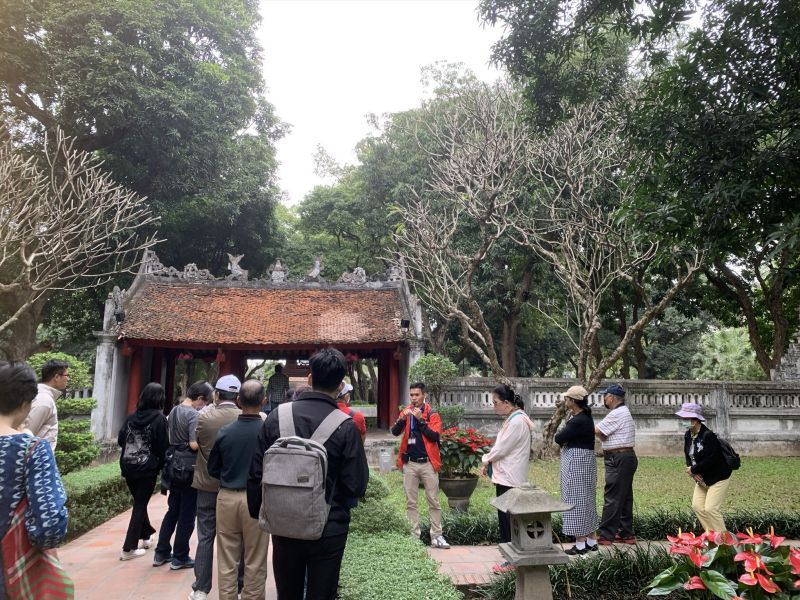 Best photography spots inside Temple of Literature Hanoi for Indian tourists with ao dai dress