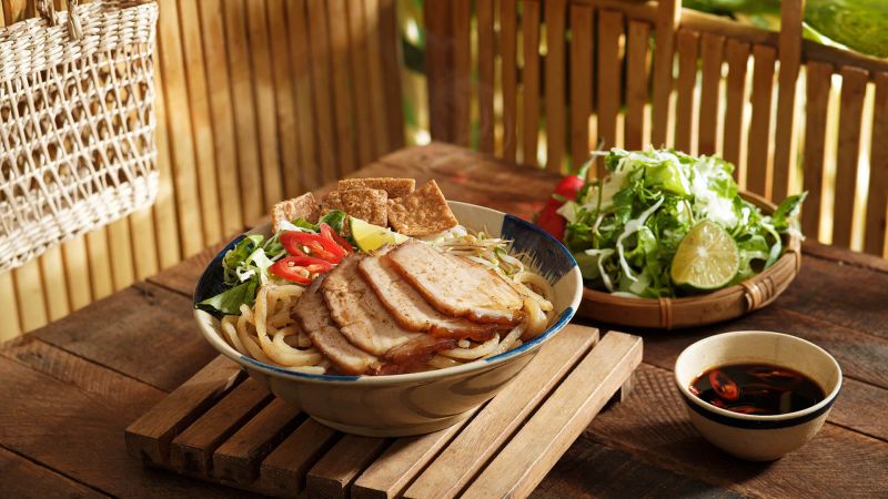 Cao Lau signature noodle dish Hoi An street food festival night