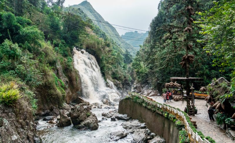 Cat Cat Waterfall 30-metre cascade plunging through forest canopy on the Muong Hoa Stream inside Cat Cat Village Sapa