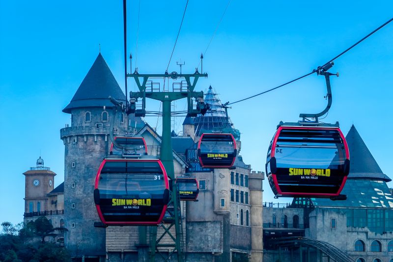 Ba Na Hills cable car gondola ascending 5,801 meters from base station to summit, holder of Guinness World Record for longest non-stop single-track cable car