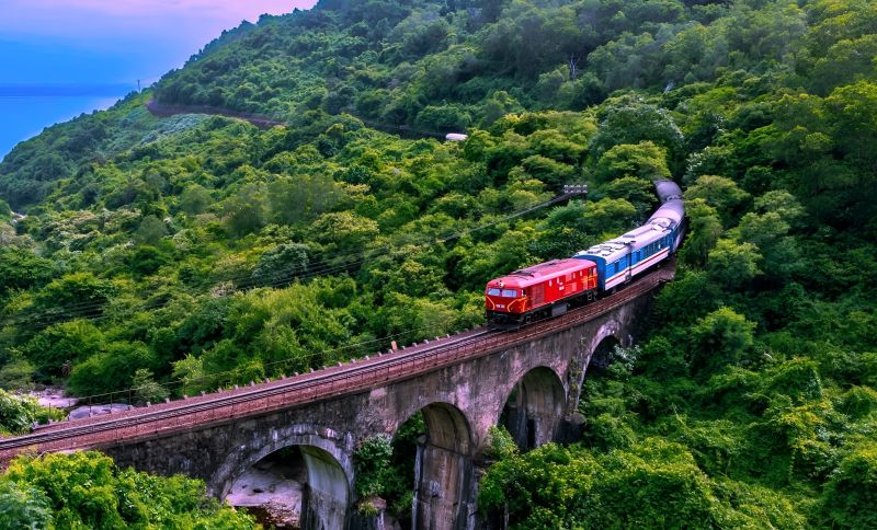 Da Nang to Hue train crossing Hai Van Pass with East Sea coastal view at 496 m elevation