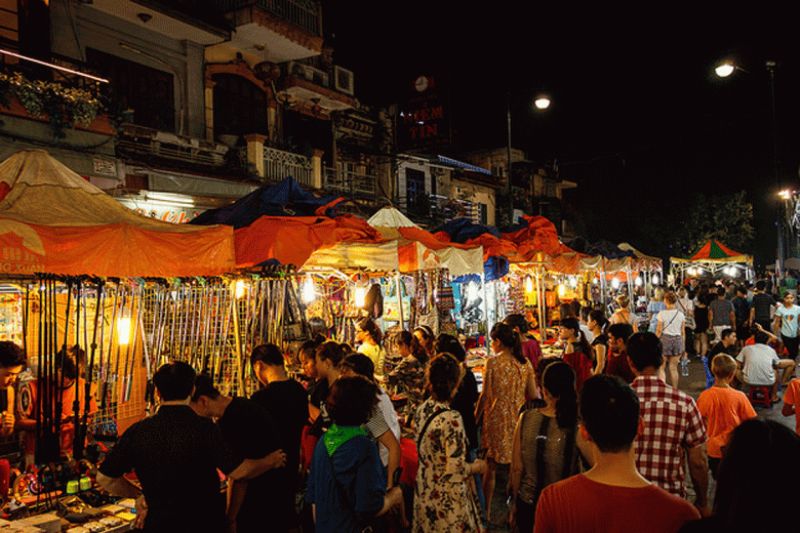 Dong Xuan Night Market Hang Dao Street weekend open air stalls 6 pm to 11 pm