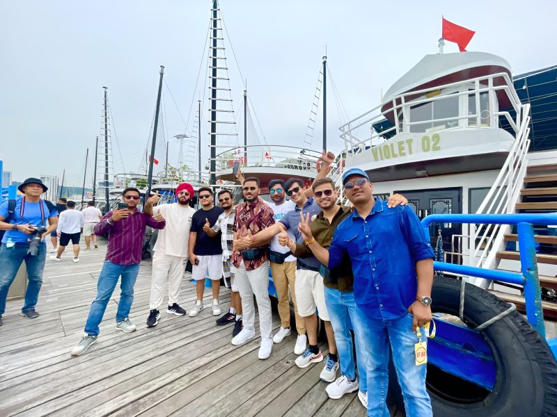 Tuan Chau Marina cruise disembarkation pier where Indian tourists transfer luggage from Halong Bay cruise to Hanoi-bound vehicles