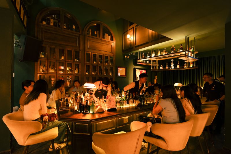 Hanoi jazz club live performance at Binh Minh Jazz Club with saxophone player on stage and audience seated within 5 metres of the musicians