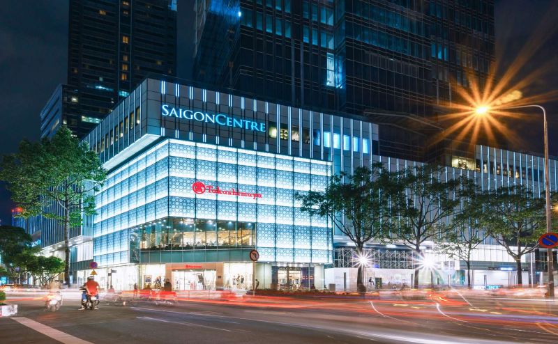 Vincom Center District 1 shopping mall facade with international brand storefronts and entrance