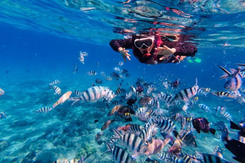 Indian tourist family on a 4-island hopping tour from Nha Trang — part of a 3-day Ho Chi Minh to Nha Trang package