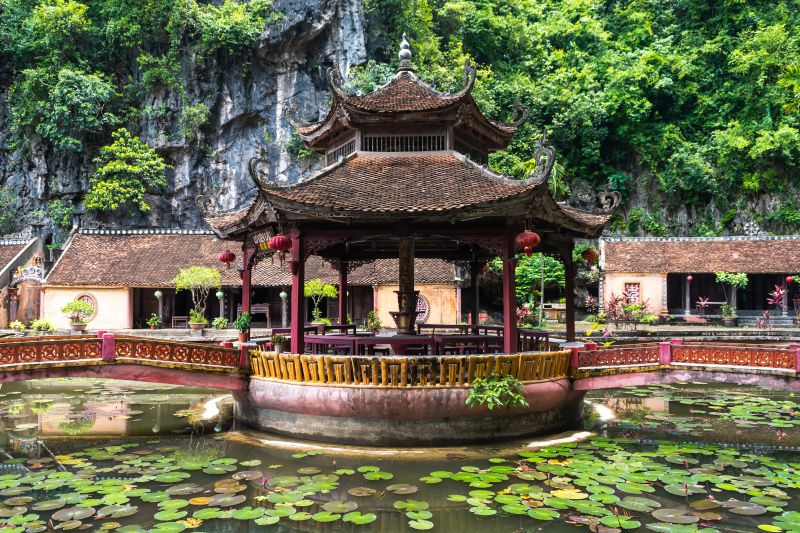 Hoa Lu Ancient Capital ticket counter with VND 20,000 adult entrance fee signage for Indian tourists