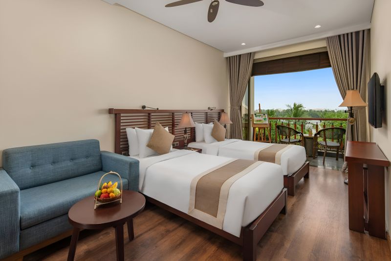 Hotel room near Hoi An Ancient Town with river view balcony