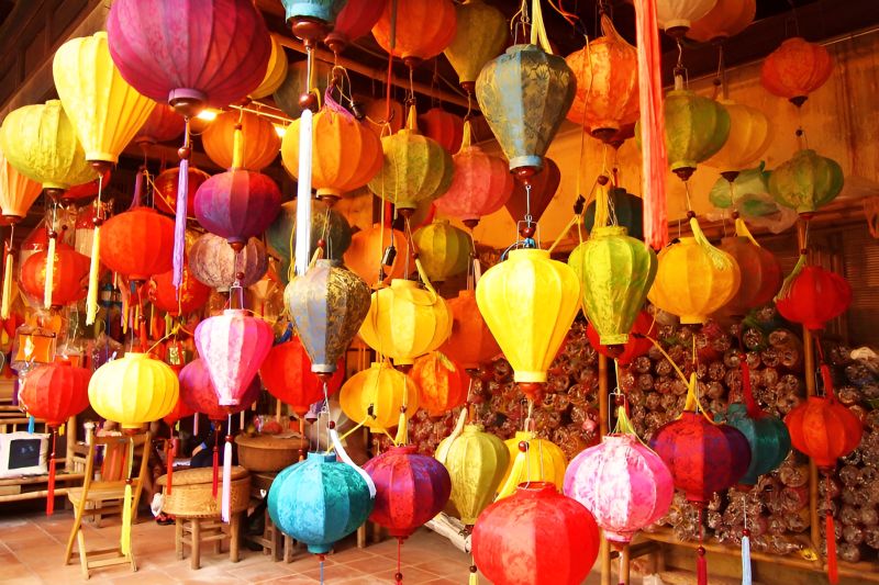 Handmade Hoi An silk lanterns at Le Loi Street workshop for souvenir shoppers
