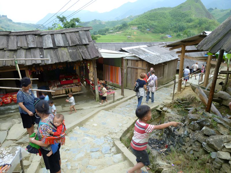 Motorbike taxi xe om travelling the 2 km route from Sapa Town centre to Cat Cat Village entrance gate 15 minute journey