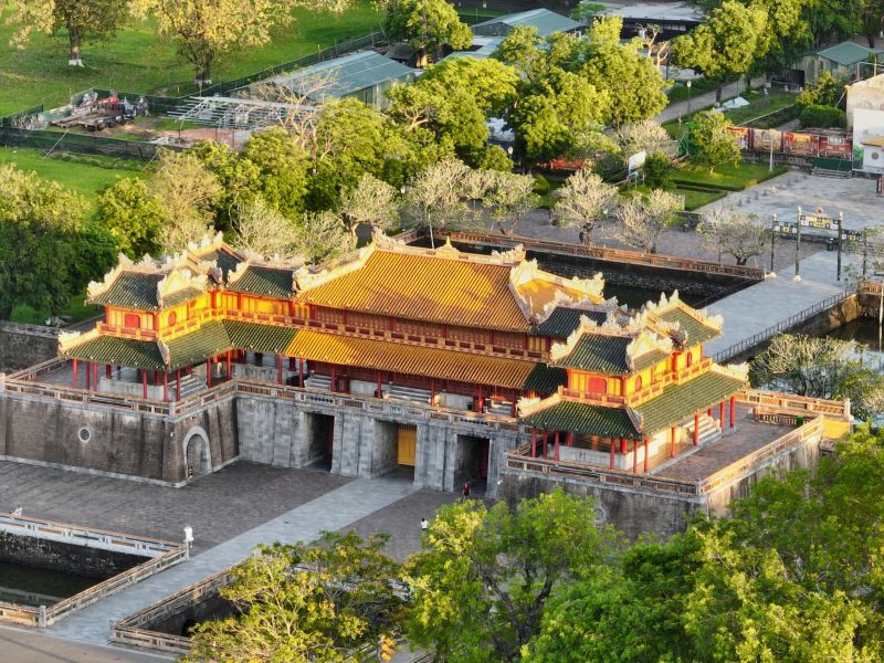Imperial Citadel of Hue UNESCO World Heritage Site Vietnam — Nguyen Dynasty royal complex gate with traditional yellow tiled roof in Thua Thien-Hue province