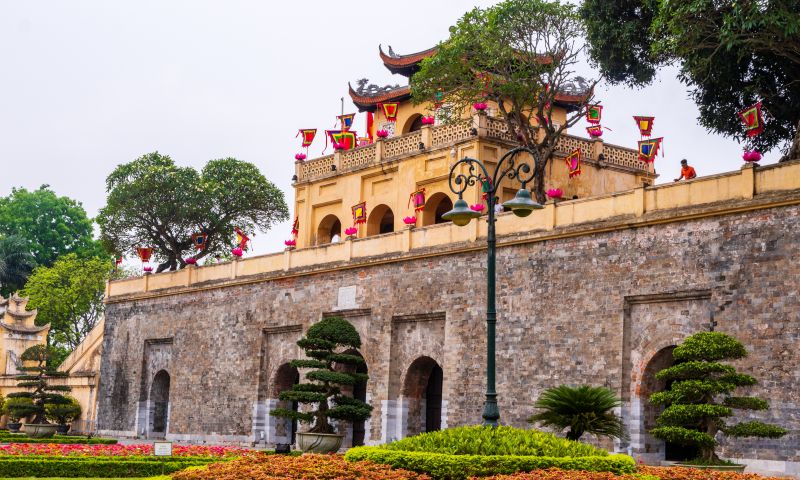 Doan Mon Gate at the Imperial Citadel of Thang Long in Hanoi, a triple-arched 15th-century brick entrance with original stone carvings