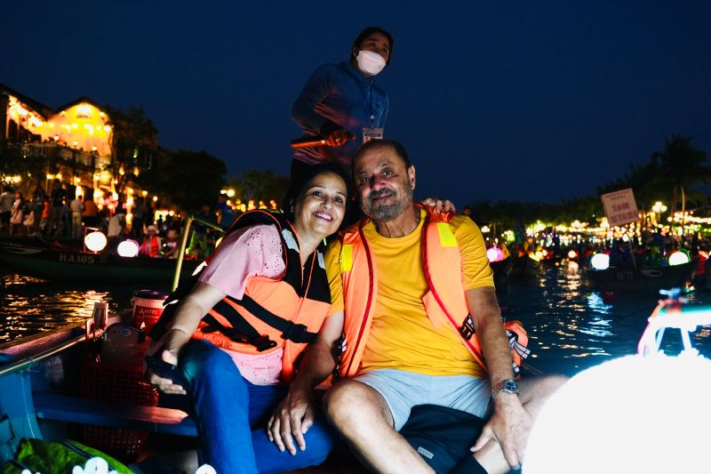 Indian tourists on Thu Bon River boat ride at Hoi An Lantern Festival