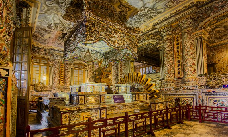 Thien Dinh Palace mosaic interior at Khai Dinh Tomb showing dragon, four-seasons, and eight-precious-objects ceramic and glass artwork