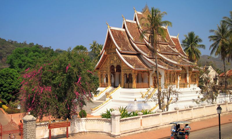 Laos dry season November to April with bright sun, clear skies and Buddhist temple architecture suited for Indian tourist sightseeing