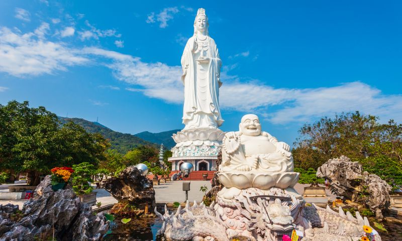 Linh Ung Pagoda on Thuy Son active Buddhist temple above Am Phu Cave Marble Mountains Da Nang with bodhisattva mudras and incense rituals