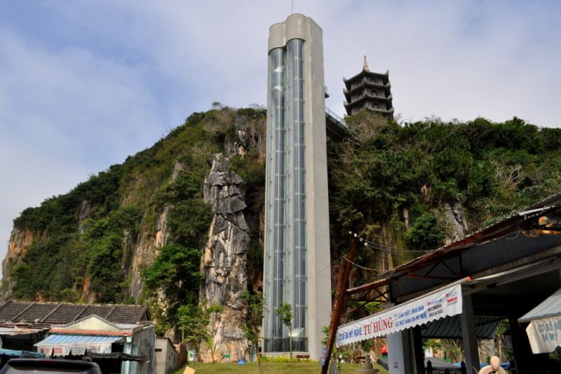Marble Mountains elevator on east side of Thuy Son providing accessible transport for elderly visitors and families