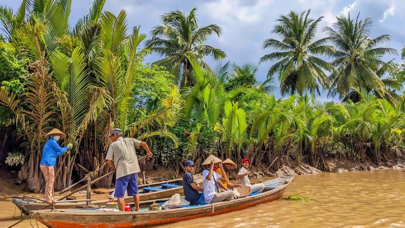 Mekong Delta sampan boat coconut canal Vietnam — river tour experience Indian tourists