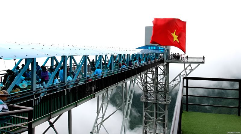 Indian tourist group on Rong May Glass Bridge guided tour package from Hanoi with Vietnamtour.in English-speaking guide