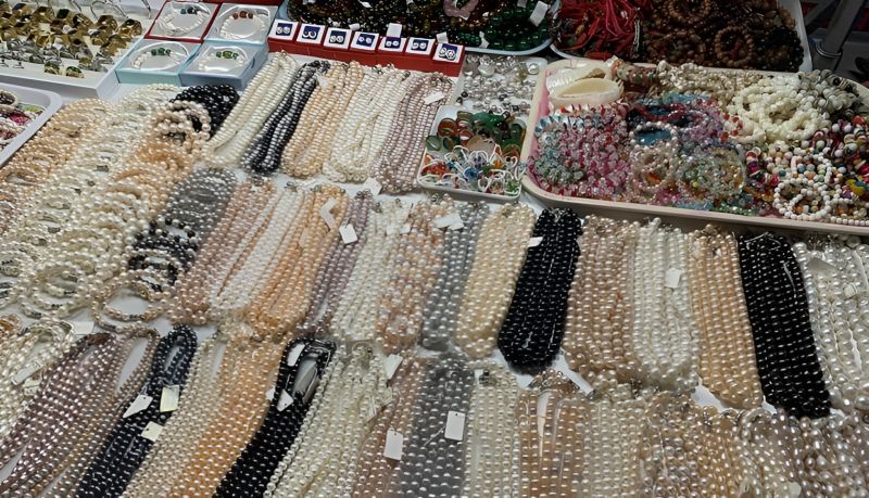 Souvenir and pearl shopping stalls at Phu Quoc Night Market in the outer lane covered northern section