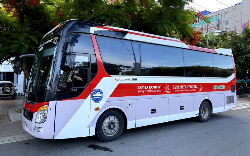 Shuttle bus from Halong Bay to Hanoi 16-seat limousine minibus parked at Tuan Chau Marina pickup point for Indian tourists
