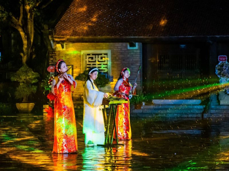 Temple of Literature night tour 3D mapping light show on Khue Van Cac pavilion facade Hanoi