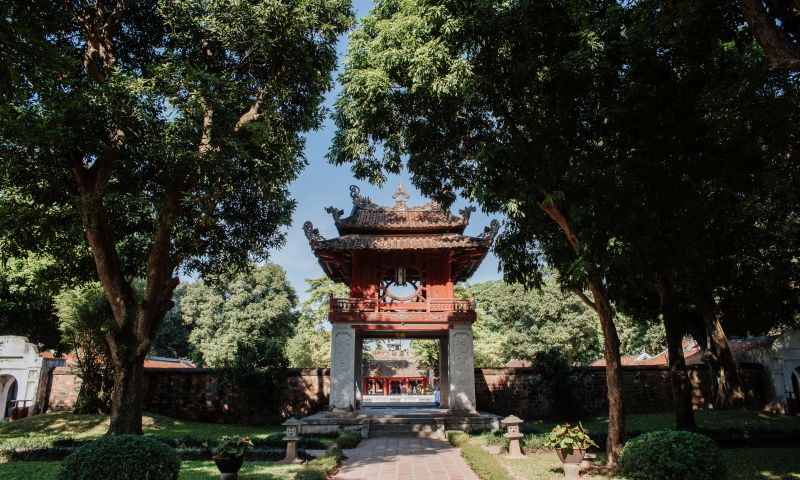 Temple of Literature in Hanoi showing the Khue Van Cac pavilion reflected in the rectangular pond inside the third courtyard