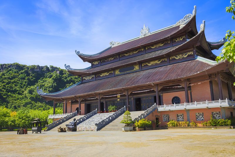 Bai Dinh Pagoda Complex in Ninh Binh showing the 500-arhat corridor and bronze Buddha within Vietnam's largest Buddhist temple