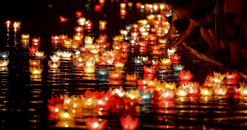 Floating paper lanterns on Thu Bon River during Hoi An full moon festival