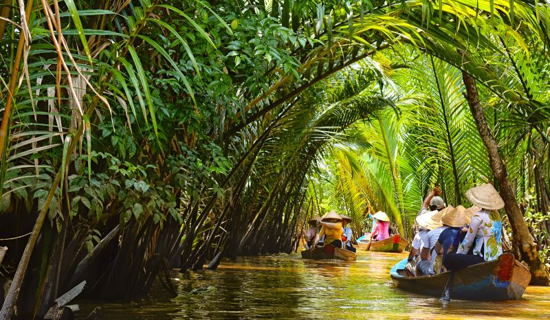 Vietnam in May southern monsoon start Ho Chi Minh City rainfall Sapa Ha Giang green landscapes