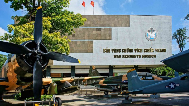 War Remnants Museum ticket counter showing ₹142 adult entry sign and opening hours 7:30 AM to 5:30 PM