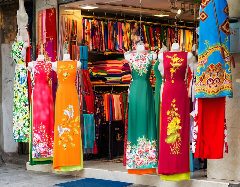 Vietnamese silk and Ao Dai fabric rolls displayed at Hang Gai Street Hanoi for Indian shoppers